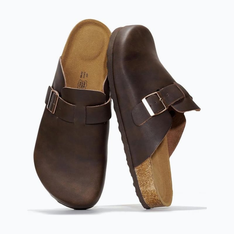 Pair of brown leather clogs with buckled straps