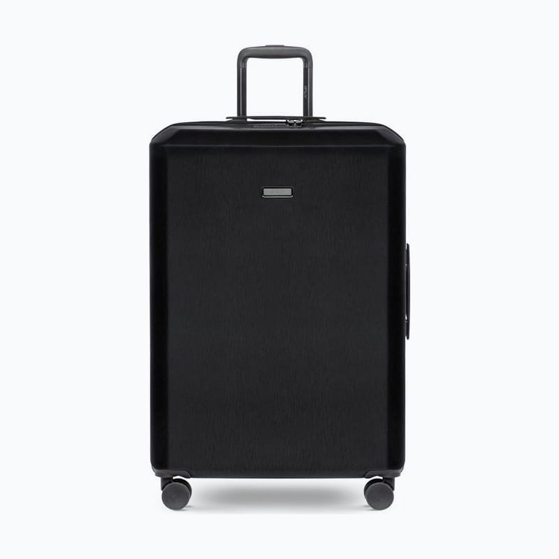Rose-gold hard-shell spinner suitcase with a telescoping handle