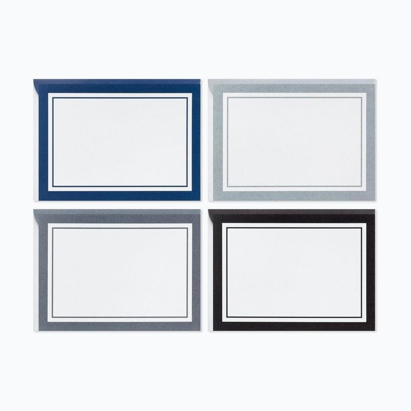 Four blank note cards with navy, gray, and black borders