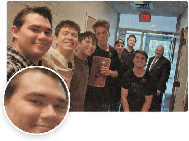 Group photo printed in Standard quality, with a magnified face: softer detail and more muted color.